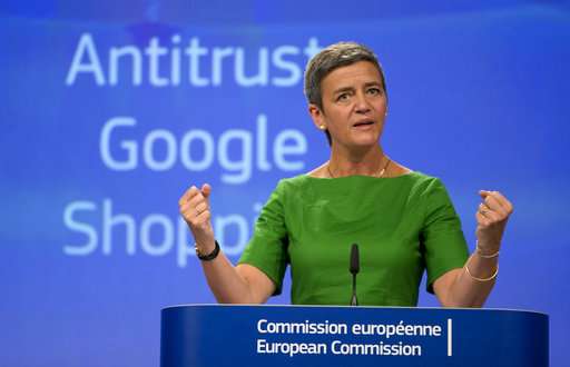 EU fines Google a record 2.4 billion euros in antitrust case