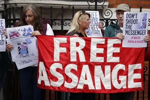 Rape inquiry dropped, WikiLeaks' Assange remains in embassy