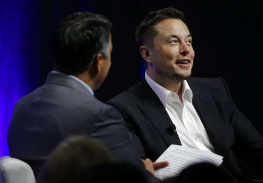 Elon Musk talks cars -- and humanity's fate -- with governors