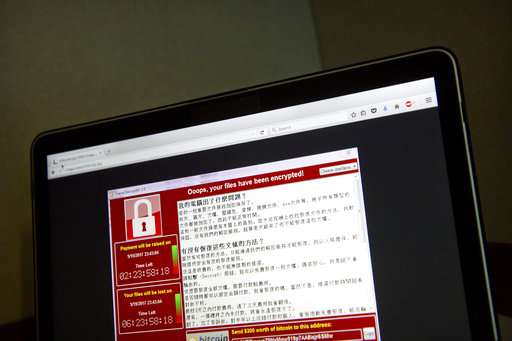 Experts: Cyberattack havoc could grow as work week begins