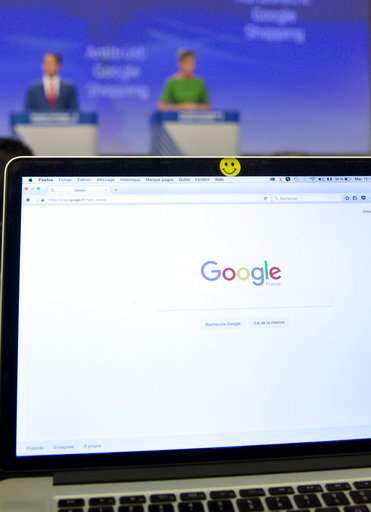 EU fines Google a record 2.4 billion euros in antitrust case