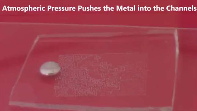 Look ma, no hands: Researchers use vacuum for hands-free patterning of liquid metal