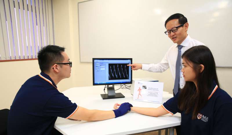 NUS researchers develop smart, ultra-thin microfibre sensor for real-time healthcare monitoring and