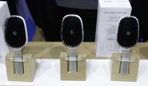 The Latest at CES: Companies up 'wow' factor to stand out