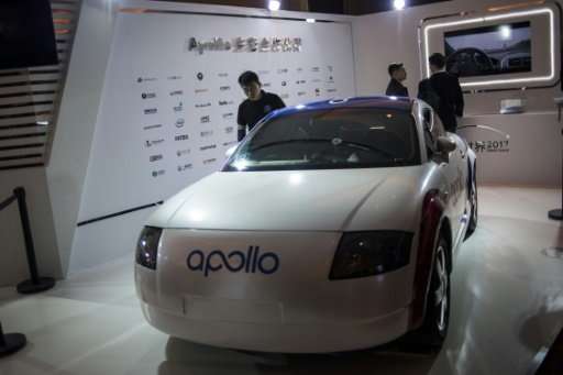 A driverless car named &quot;Apollo&quot; is displayed at the annual Baidu World Technology Conference in Beijing on November 16