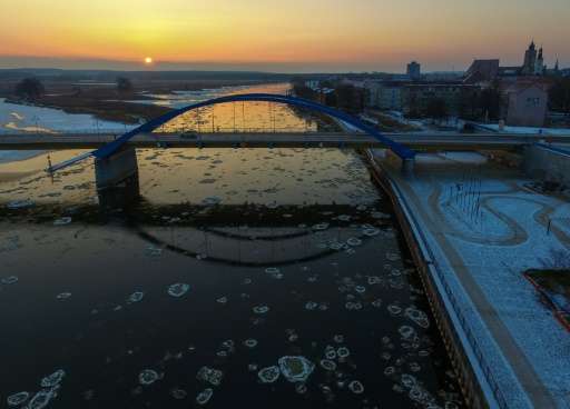 Aerial view shows round pieces of ice, so-called &quot;Pfannkucheneis&quot; (pancake ice), floating on the river Oder between no