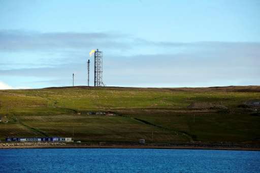 A gas flare burns at the Shetland Gas Plant