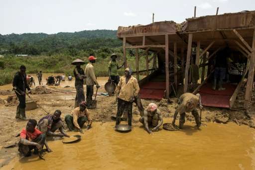 A group of galamseyers, illegal gold panners, working in the Kibi area of Ghana, long known for its bountiful gold reserves.