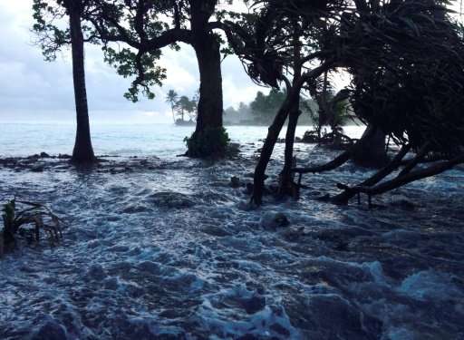 A high tide energized by storm surges washed across Ejit Island in the Marshall Islands in 2014