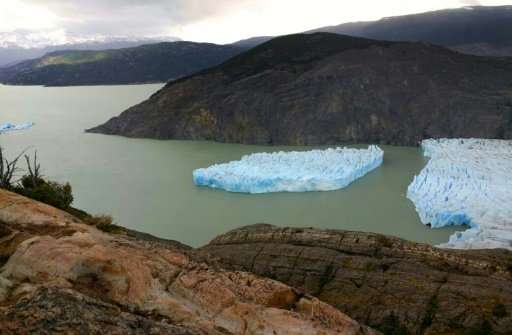 A large piece detaches from the Grey Glacier in Chile's far southern Patagonia region, as seen on Novembeer 28, 2017 in this han