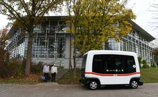 All aboard... German railway company DB's first driverless bus as it tests future modes of transport.
