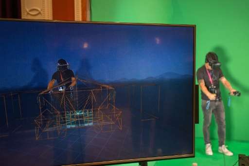 A monitor reveals the virtual reality experience of a man using the HTC Vive during the 2017 Consumer Electronic Show in Las Veg