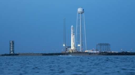 An Antares rocket with an unmanned Cygnus spacecraft onboard that will bring 7,400 pounds (3,356 kilograms) of food, supplies, e