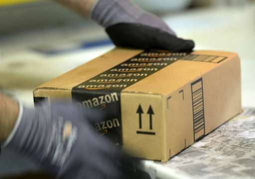 An employee prepares order at Amazon's San Bernardino Fulfillment Center