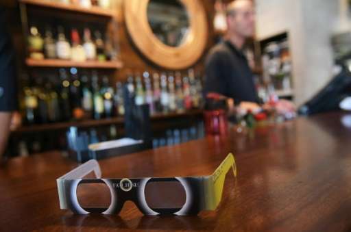 A pair of solar eclipse glasses are seen for sale at a restaurant ahead of the total solar eclipse in Charleston, South Carolina