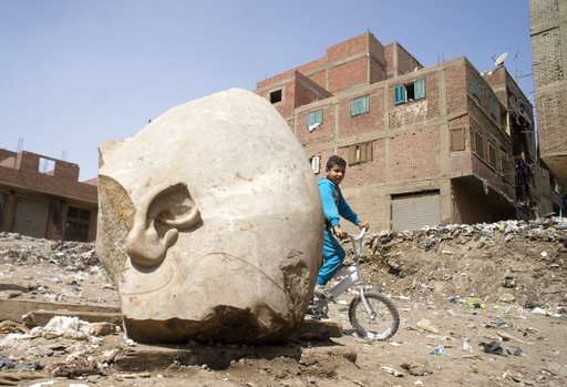 Archeologists in Egypt discover massive statue in Cairo slum