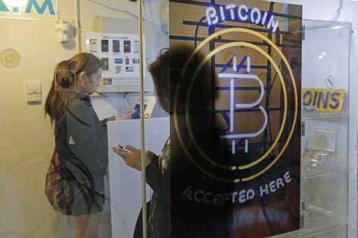 As Bitcoin, other currencies soar, regulators urge caution