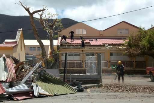 A school is repaired in Marigot on the French Caribbean island of St Martin after Hurricane Irma battered the region earlier thi