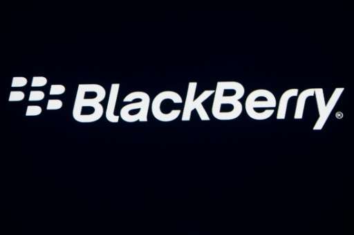 BlackBerry, who logo is displayed at the Mobile World Congress in Barcelona, is getting $815 million from chipmaker Qualcomm fol