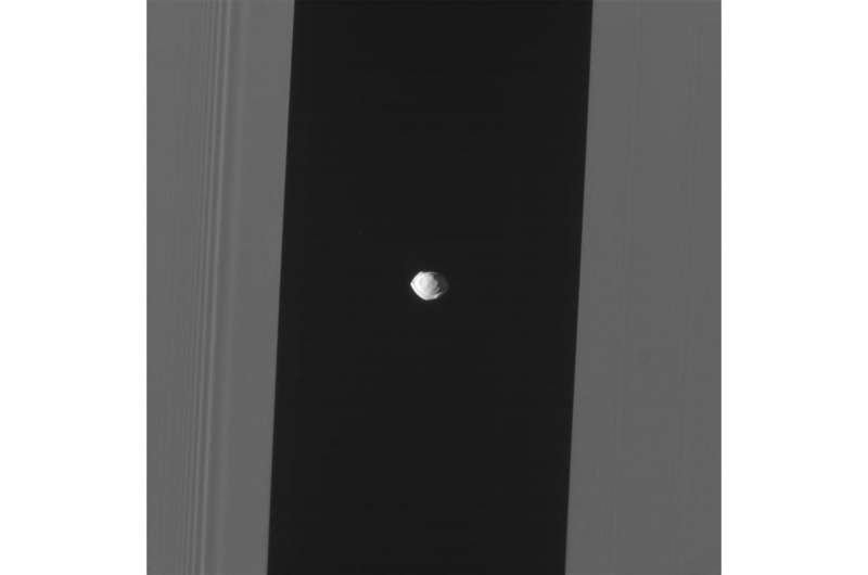 Cassini reveals strange shape of Saturn's moon Pan