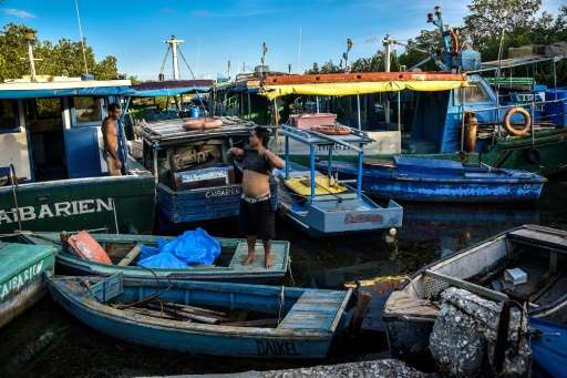Cubans put their fishing boats in safe places ahead of the arrival of Hurricane Irma, in Caibarien