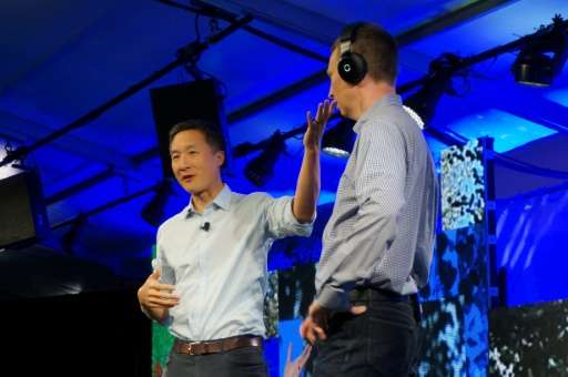 Daniel Chao, co-founder of Halo Neuroscience, displays his company's device to improve brain performance