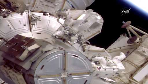 Equipment water leak shortens spacewalk by two US astronauts