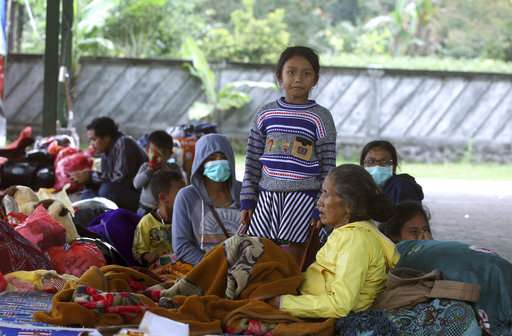 Evacuations from Bali volcano swell to more than 57,000