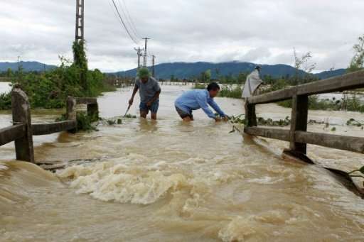 Floods and landslides in central and northern Vietnam have killed at least 37 people, with dozens more missing