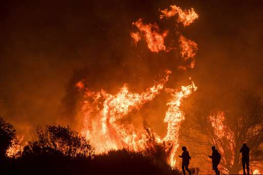 Forecast of higher winds could complicate wildfire fight