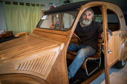 French cabinetmaker Michel Robillard took six years to craft a lifesize and fully operational handbuilt wooden 2CV Citroen Car