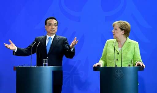 German Chancellor Angela Merkel and Chinese Prime Minister Li Keqiang give a joint press conference in Berlin on June 1, 2017