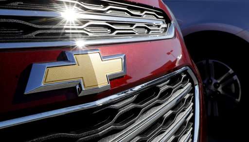 GM 2Q net earnings fall on loss from sale of European unit