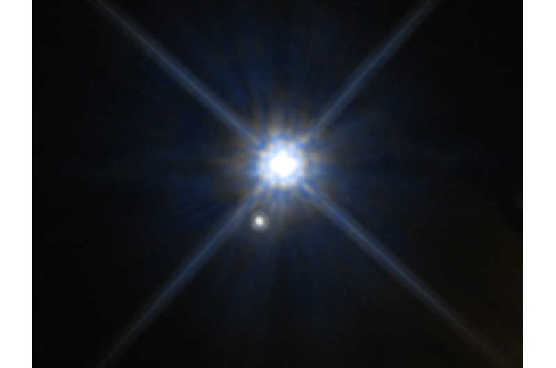 Hubble astronomers use a century-old relativity experiment to measure a white dwarf's mass