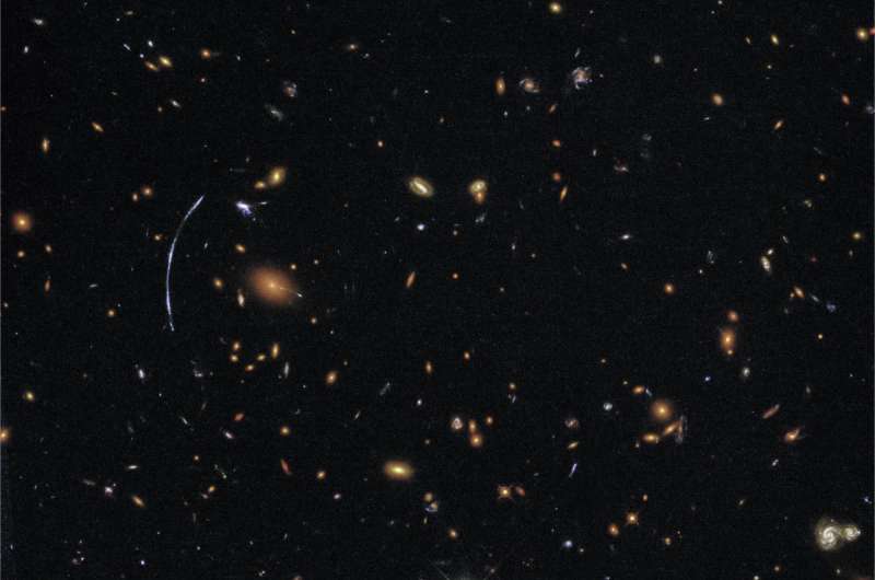 Hubble pushed beyond limits to spot clumps of new stars in distant galaxy