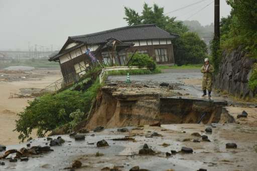 Huge floods engulfing parts of southern Japan have left hundreds stranded