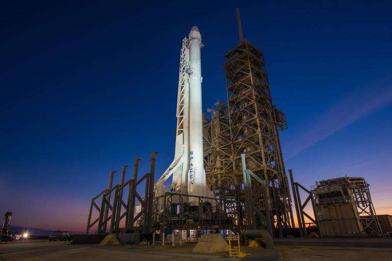 Image: Falcon 9 rocket with Dragon spacecraft vertical at Launch Complex 39A