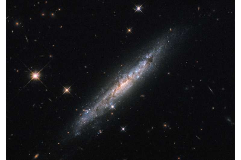Image: Hubble frames an explosive galaxy