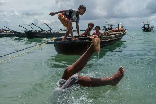 Impoverished, stateless and with restricted working rights, some Moken began diving for fishing crews in the early 90s and conti