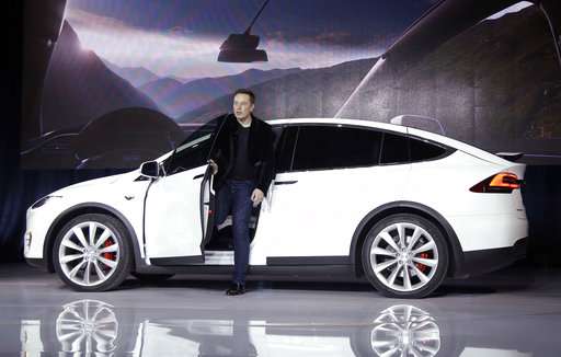 Investors pick Tesla's promise over GM's steady profits