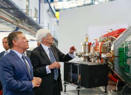 Jordan's King Abdullah II (L) attends the launch of The International Centre for Synchrotron-Light for Experimental Science and 