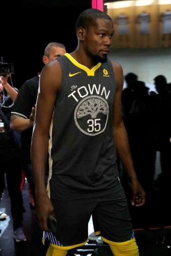 Kevin Durant of the Golden State Warriors debuts the new jersey during the unveiling of the New NBA Partnership with Nike, in Lo