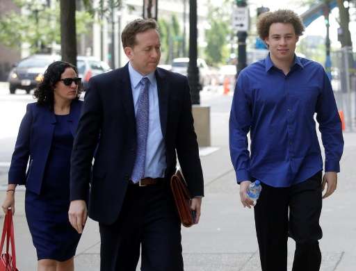 Marcus Hutchins (R), the British cyber security expert accused of creating and selling malware that steals banking passwords, ap