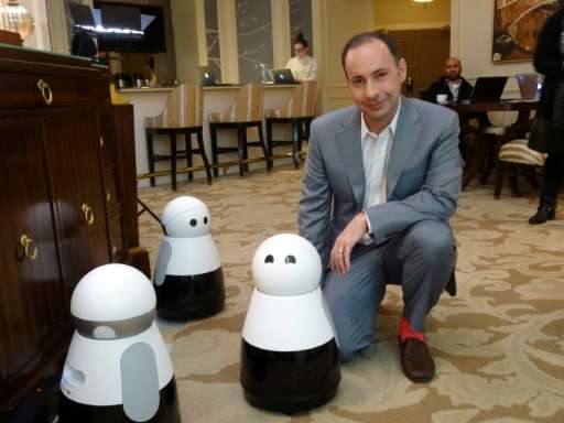 Mayfield Robotics chief executive Michael Beebe unveils the Kuri robot at the Consumer Electronics Show in Las Vegas, on January