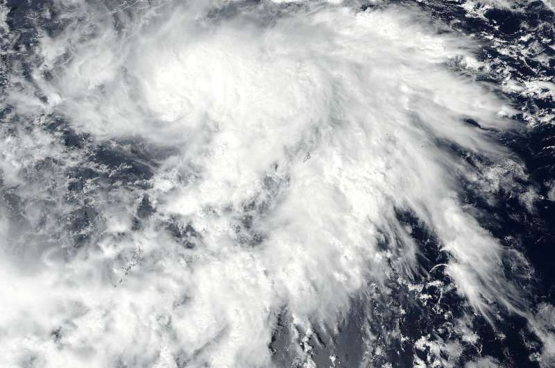 NASA finds newly formed tropical storm lan over open waters