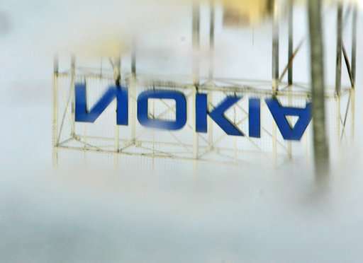 Nokia reports loss, warns of decline in networks industry
