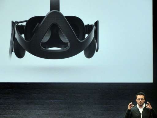 Oculus chief executive Brendan Iribe unveils Rift virtual reality head gear, in San Francisco, in 2015