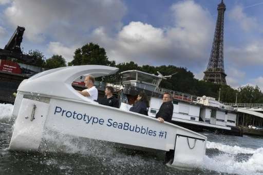 Paris Mayor Anne Hidalgo took a spin on the Seine for a test ride of the electric Sea Bubble water taxi