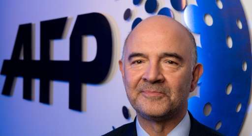 Pierre Moscovici, Commissioner for Economic and Finacial Affairs, Taxation and Customs of the European Commission poses for a ph