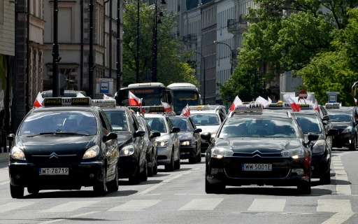 Polish taxi drivers blocked the streets of Warsaw to protest against ride sharing app Uber and competitors, arguing they represe